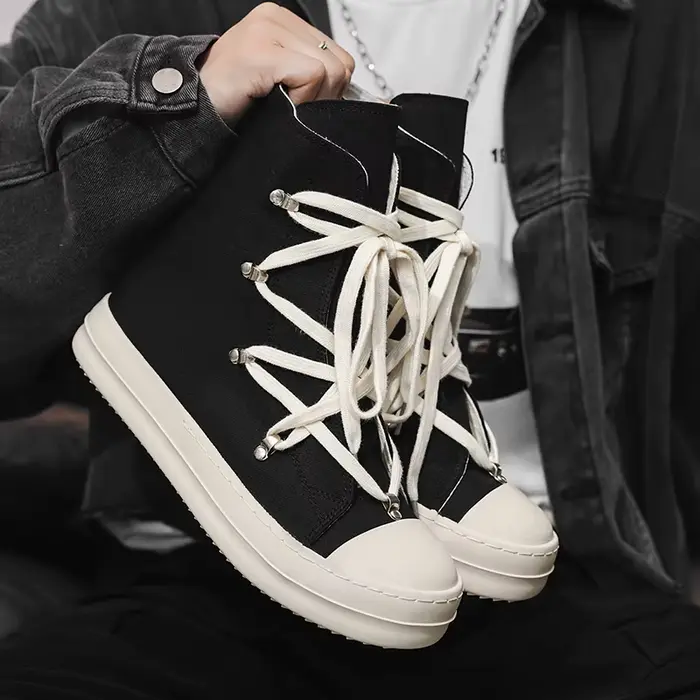 Bottes montantes en toile noire au design classique pour hommes et femmes