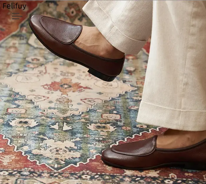 Chaussures décontractées noires pour hommes en cuir véritable à enfiler