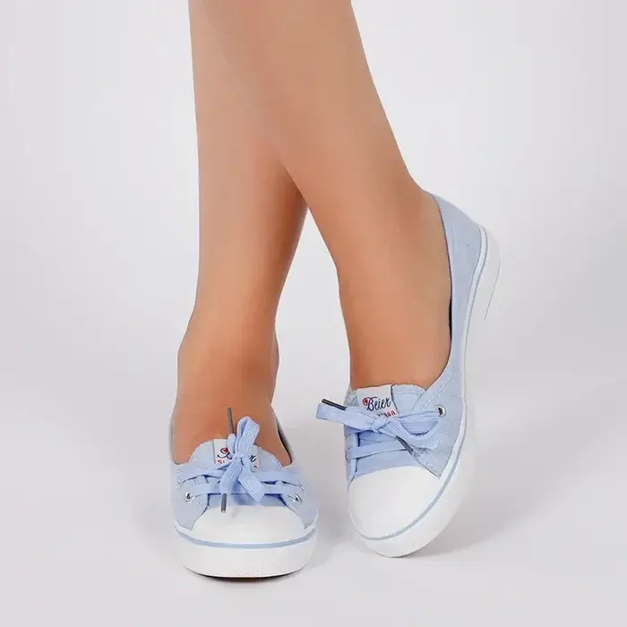 Baskets en toile blanches peu profondes pour femmes