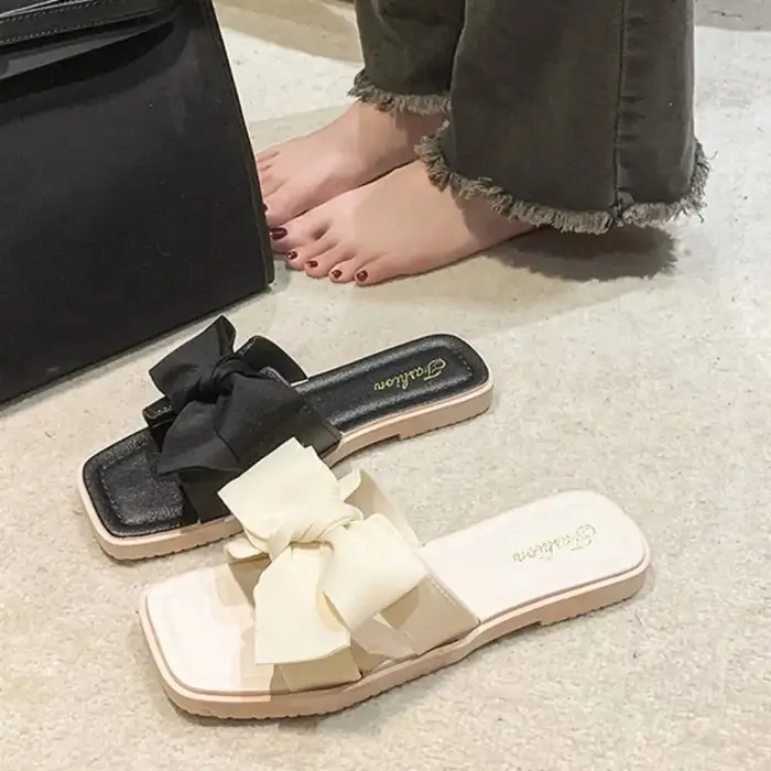 Pantoufles élégantes à semelle souple avec nœud papillon