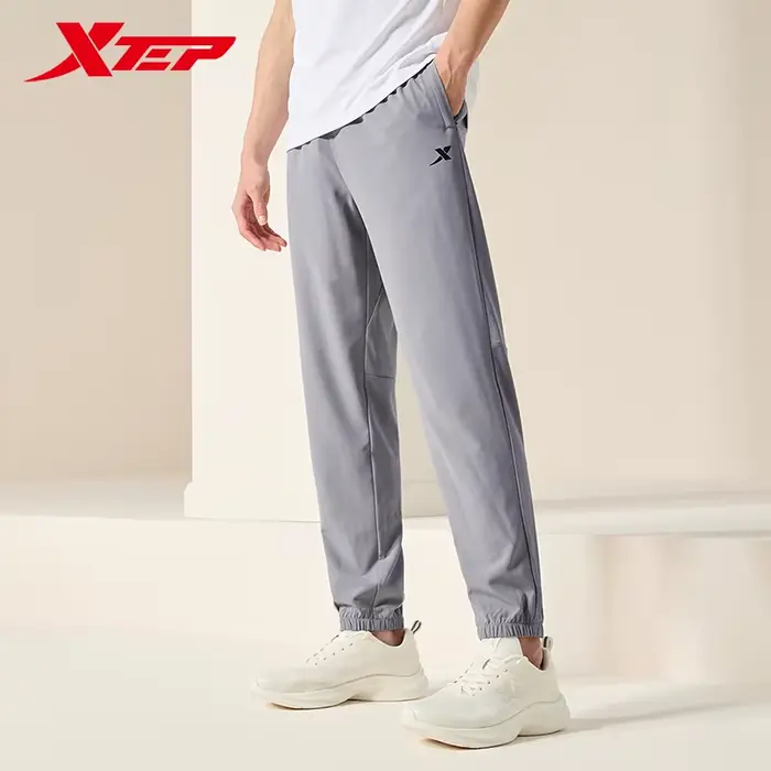 Xtep tissé pantalons de survêtement pour hommes été Normcore hommes pantalons de survêtement trajet 