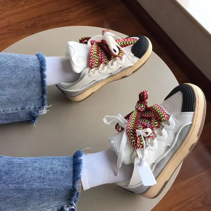 Top Designer rétro chaussures de sport pour hommes femmes tout-match fouet conception Niche baskets livraison directe