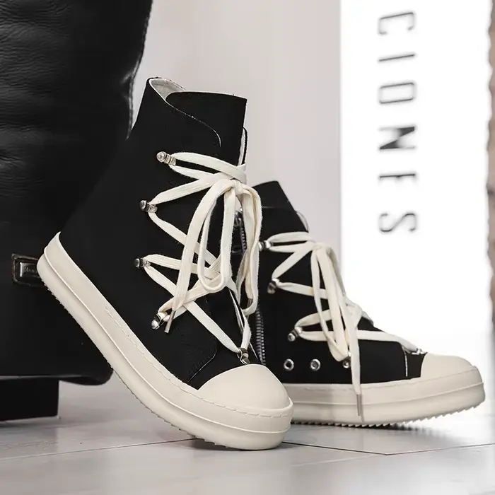 Bottes montantes en toile noire au design classique pour hommes et femmes