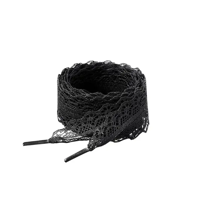 1 paire de lacets de chaussures noirs et blancs