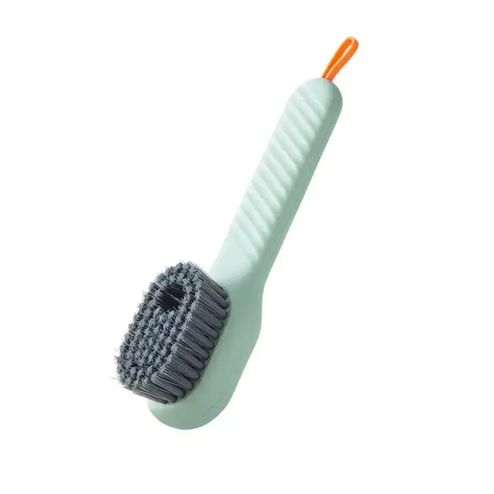 Brosse à chaussures multifonctionnelle à décharge automatique de liquide