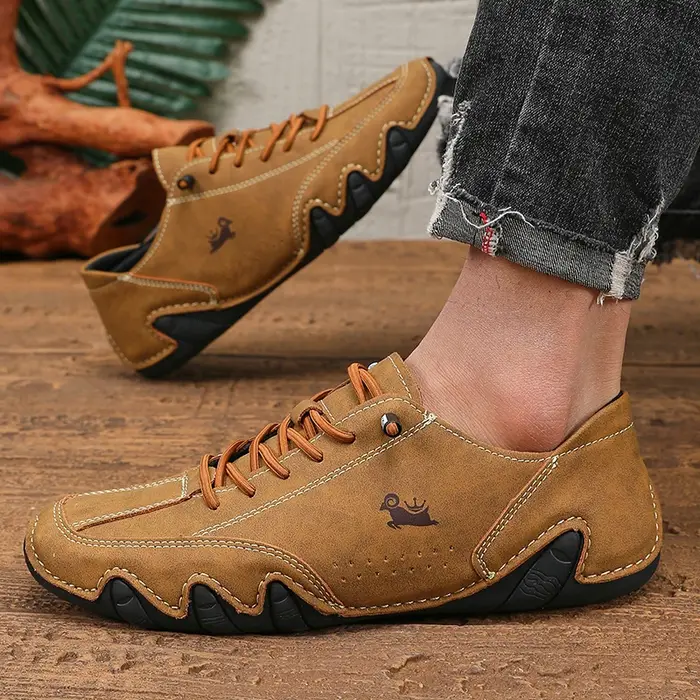 Printemps hommes coupe basse en cuir Sneaker mocassins à semelles souples anti-dérapant fond plat chaussures décontractées grande taille Zapatillas Para Hombre 2025