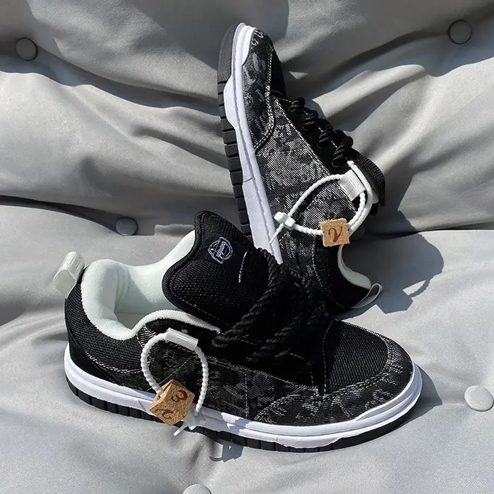 Chaussures basses épaisses noires et grises avec protection de la languette