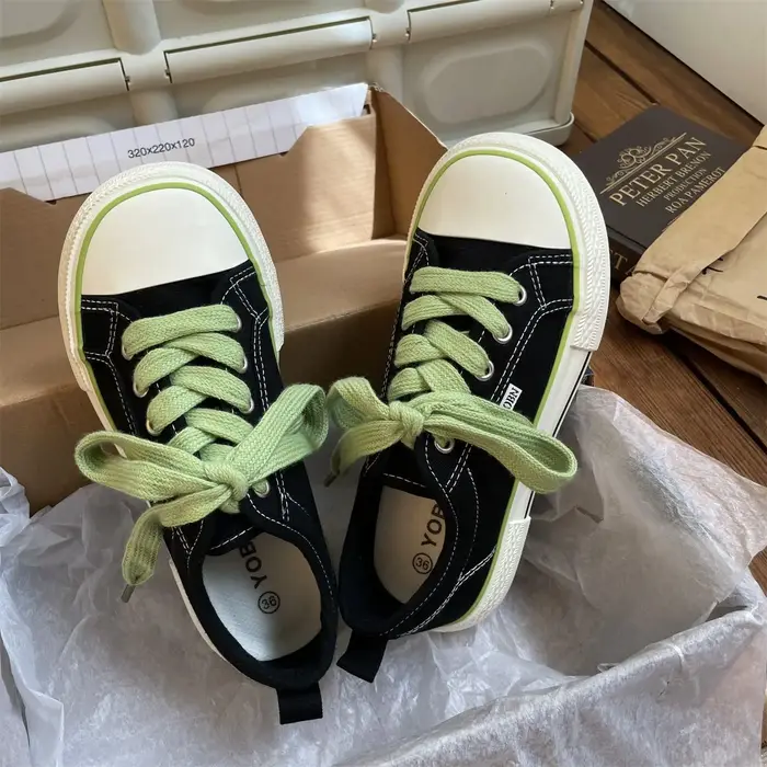 Chaussures plates en toile pour femmes