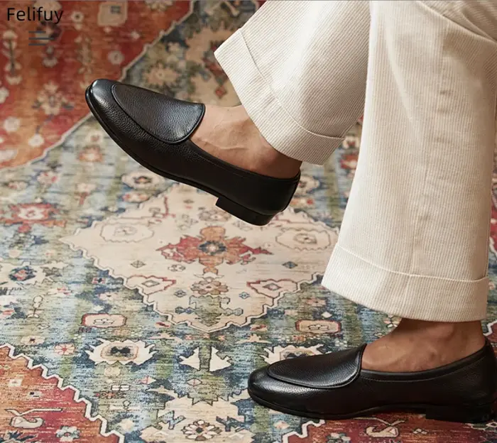 Chaussures décontractées noires pour hommes en cuir véritable à enfiler