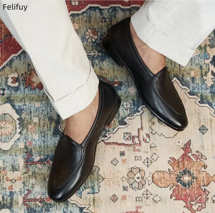 Chaussures décontractées noires pour hommes en cuir véritable à enfiler