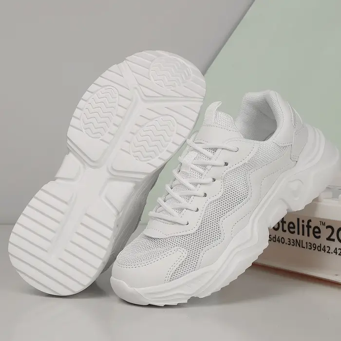 Baskets décontractées polyvalentes noires à semelle épaisse pour femme