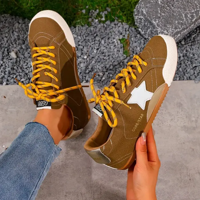 Rétro en cuir véritable Deqin chaussures femmes baskets 2025 nouveau Style polyvalent porté fond plat sport décontracté