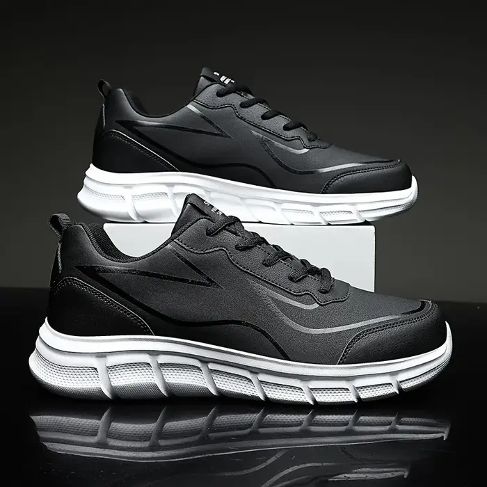 Chaussures de course noires en cuir imperméables
