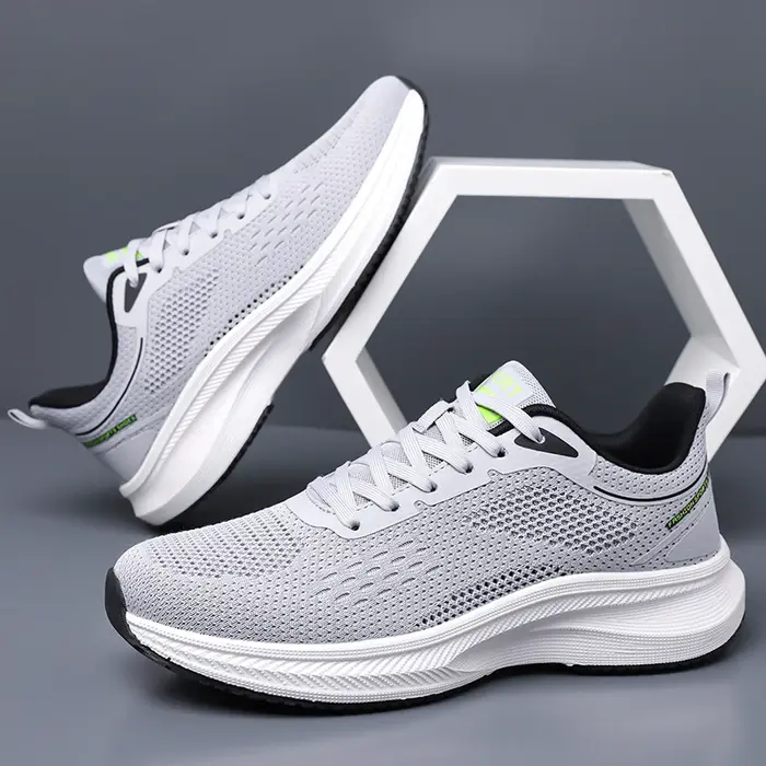 Chaussures de course en maille blanche pour hommes