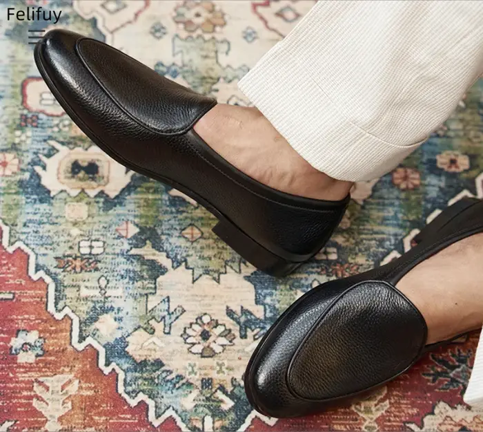 Chaussures décontractées noires pour hommes en cuir véritable à enfiler