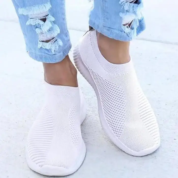 Chaussures plates blanches à enfiler pour femme