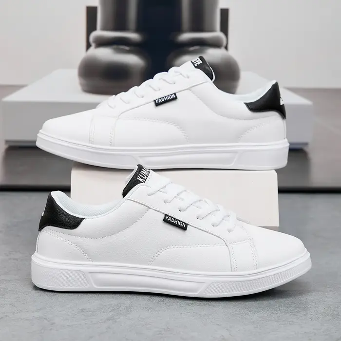 Hommes chaussures confortable décontracté pour femmes baskets en cuir blanc léger marche plat Sport de plein air course Tennis zapatillas
